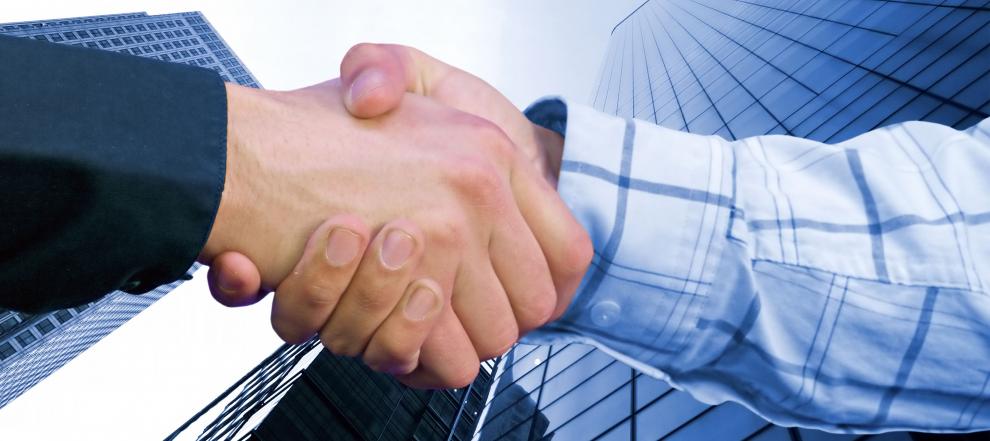 financial leaders shaking hands